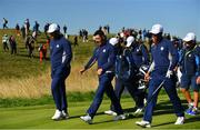 25 September 2018; Europe players, from left, Jon Rahm, Rory McIlroy, and Thorbjørn Olesen walk the fairways during a practice round ahead of the Ryder Cup 2018 Matches at Le Golf National in Paris, France. Photo by Ramsey Cardy/Sportsfile