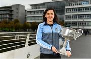 25 September 2018; Dublin Footballer Paul Mannion and Ladies footballer Lyndsey Davey, along with the Sam Maguire and Brendan Martin Cups, were at AIG Insurance’s head office in Dublin today to mark Dublin's All-Ireland wins. AIG’s chosen charity for 2018, Aoibheann’s Pink Tie, also joined in the celebrations and were presented with a signed Dublin GAA jersey. In attendance at the AIG Cups visit is Dublin Ladies footballer Lyndsey Davey with the Brendan Martin Cup at AIG Offices in Dublin. Photo by Sam Barnes/Sportsfile