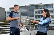 25 September 2018; Dublin Footballer Paul Mannion and Ladies footballer Lyndsey Davey, along with the Sam Maguire and Brendan Martin Cups, were at AIG Insurance’s head office in Dublin today to mark Dublin's All-Ireland wins. AIG’s chosen charity for 2018, Aoibheann’s Pink Tie, also joined in the celebrations and were presented with a signed Dublin GAA jersey. In attendance at the AIG Cups visit are Dublin footballer Paul Mannion and Dublin ladies footballer Lyndsey Davey with the Sam Maguire Cup at AIG Offices in Dublin. Photo by Sam Barnes/Sportsfile