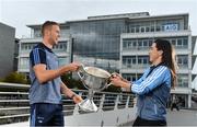 25 September 2018; Dublin Footballer Paul Mannion and Ladies footballer Lyndsey Davey, along with the Sam Maguire and Brendan Martin Cups, were at AIG Insurance’s head office in Dublin today to mark Dublin's All-Ireland wins. AIG’s chosen charity for 2018, Aoibheann’s Pink Tie, also joined in the celebrations and were presented with a signed Dublin GAA jersey. In attendance at the AIG Cups visit are Dublin footballer Paul Mannion and Dublin ladies footballer Lyndsey Davey with the Brendan Martin Cup at AIG Offices in Dublin. Photo by Sam Barnes/Sportsfile