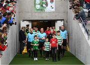 25 September 2018; Members of the Miller family lead the teams out prior to the Liam Miller Memorial match between Manchester United Legends and Republic of Ireland & Celtic Legends at Páirc Uí Chaoimh in Cork. Photo by Stephen McCarthy/Sportsfile