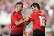 25 September 2018; Roy Keane of Manchester United Legends receives the captains armband from Ryan Giggs prior to coming on as a substitute during the Liam Miller Memorial match between Manchester United Legends and Republic of Ireland & Celtic Legends at Páirc Uí Chaoimh in Cork. Photo by David Fitzgerald/Sportsfile