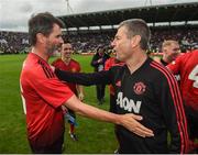 25 September 2018; Roy Keane, left, and Denis Irwin of Manchester United Legends following the Liam Miller Memorial match between Manchester United Legends and Republic of Ireland & Celtic Legends at Páirc Uí Chaoimh in Cork. Photo by Stephen McCarthy/Sportsfile