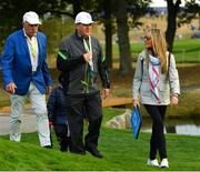 28 September 2018; Dermot Desmond, left, JP McManus and Erica McIlroy walk the course to follow Rory McIlroy and Thorbjørn Olesen of Europe during their Fourball Match against Dustin Johnson and Rickie Fowler of USA during the Ryder Cup 2018 Matches at Le Golf National in Paris, France. Photo by Ramsey Cardy/Sportsfile