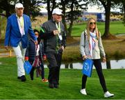28 September 2018; Dermot Desmond, left, JP McManus and Erica McIlroy walk the course to follow Rory McIlroy and Thorbjørn Olesen of Europe during their Fourball Match against Dustin Johnson and Rickie Fowler of USA during the Ryder Cup 2018 Matches at Le Golf National in Paris, France. Photo by Ramsey Cardy/Sportsfile