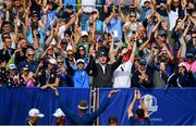 28 September 2018; Ian Poulter and Rory McIlroy of Europe perform the Viking Thunder Clap with supporters on the 1st tee prior to their Afternoon Foursome Match against Bubba Watson and Webb Simpson of USA during the Ryder Cup 2018 Matches at Le Golf National in Paris, France. Photo by Ramsey Cardy/Sportsfile