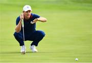 28 September 2018; Justin Rose of Europe lines up a putt during his Afternoon Foursome Match against Dustin Johnson and Rickie Fowler of USA during the Ryder Cup 2018 Matches at Le Golf National in Paris, France. Photo by Ramsey Cardy/Sportsfile