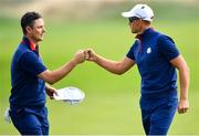 28 September 2018; Justin Rose, left, and Henrik Stenson of Europe celebrate after winning the 6th hole during their Afternoon Foursome Match against Dustin Johnson and Rickie Fowler of USA during the Ryder Cup 2018 Matches at Le Golf National in Paris, France. Photo by Ramsey Cardy/Sportsfile