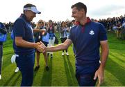 28 September 2018; Ian Poulter, left, and Rory McIlroy of Europe following their win in the Afternoon Foursome Match against Bubba Watson and Webb Simpson of USA during the Ryder Cup 2018 Matches at Le Golf National in Paris, France. Photo by Ramsey Cardy/Sportsfile