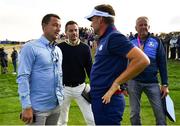 28 September 2018; Ian Poulter of Europe, right, and professional footballer John Terry following his win in the Afternoon Foursome Match against Bubba Watson and Webb Simpson of USA during the Ryder Cup 2018 Matches at Le Golf National in Paris, France. Photo by Ramsey Cardy/Sportsfile