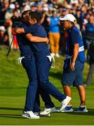 28 September 2018; Ian Poulter, left and Rory McIlroy of Europe celebrate on the 16th green following their Afternoon Foursome Match against Dustin Johnson and Rickie Fowler of USA during the Ryder Cup 2018 Matches at Le Golf National in Paris, France. Photo by Ramsey Cardy/Sportsfile
