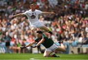 5 August 2018; Jimmy Hyland of Kildare looks on after taking a shot as despite the efforts of Cathal Horan of Mayo during the EirGrid GAA Football All-Ireland U20 Championship final match between Mayo and Kildare at Croke Park in Dublin. Photo by Piaras Ó Mídheach/Sportsfile