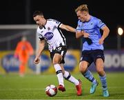 28 September 2018; Robbie Benson of Dundalk in action against Greg Sloggett of UCD during the Irish Daily Mail FAI Cup Semi-Final match between Dundalk and UCD at Oriel Park in Dundalk, Co Louth. Photo by Stephen McCarthy/Sportsfile
