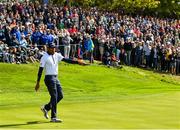 29 September 2018; Tony Finau of USA celebrates after a putt on the 16th green during his Fourball Match against Sergio García and Rory McIlroy of Europe during the Ryder Cup 2018 Matches at Le Golf National in Paris, France. Photo by Ramsey Cardy/Sportsfile