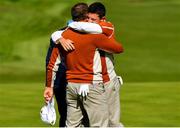 29 September 2018; Sergio García, left, and Rory McIlroy of Europe celebrate after winning on the 17th green following their Fourball Match against Tony Finau and Brooks Koepka of USA during the Ryder Cup 2018 Matches at Le Golf National in Paris, France. Photo by Ramsey Cardy/Sportsfile