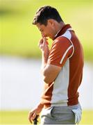 29 September 2018; Rory McIlroy of Europe reacts after a missed putt on the 10th green during his Foursome Match against Justin Thomas and Jordan Spieth of USA during the Ryder Cup 2018 Matches at Le Golf National in Paris, France. Photo by Ramsey Cardy/Sportsfile