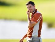 29 September 2018; Rory McIlroy of Europe reacts after a missed putt on the 10th green during his Foursome Match against Justin Thomas and Jordan Spieth of USA during the Ryder Cup 2018 Matches at Le Golf National in Paris, France. Photo by Ramsey Cardy/Sportsfile