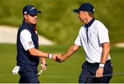 29 September 2018; Justin Thomas, left and Jordan Spieth of USA celebrates after winning the 11th hole during their Foursome Match against Ian Poulter and Rory McIlroy of Europe during the Ryder Cup 2018 Matches at Le Golf National in Paris, France. Photo by Ramsey Cardy/Sportsfile