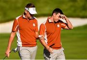 29 September 2018; Rory McIlroy, right, and Ian Poulter of Europe react after a missed putt during his Foursome Match against Justin Thomas and Jordan Spieth of USA during the Ryder Cup 2018 Matches at Le Golf National in Paris, France. Photo by Ramsey Cardy/Sportsfile