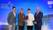 29 September 2018; Tiarnan Woods of Drumsurn, Derry, is presented with his Football Team of the Year Award by Pat O’Doherty, ESB Chief Executive, alongside Former Tyrone footballer and Electric Ireland Minor Star Awards judge Sean Cavanagh, left, and Uachtarán Chumann Lúthcleas Gael John Horan. The Hurling and Football Team of the Year was selected by an expert panel of GAA legends including Ollie Canning, Sean Cavanagh, Michael Fennelly and Daniel Goulding. Sponsors of the GAA Minor Championships, Electric Ireland today recognised the talent and dedication of 15 Minor football players, and 15 Minor hurling players at the second annual Electric Ireland Minor Star Awards at Croke Park. #GAAThisIsMajor Photo by Sam Barnes/Sportsfile