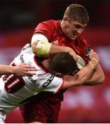 29 September 2018; Dan Goggin of Munster is tackled by Billy Burns of Ulster during the Guinness PRO14 Round 5 match between Munster and Ulster at Thomond Park in Limerick. Photo by Matt Browne/Sportsfile