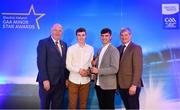 29 September 2018; Electric Ireland Minor Hurler of the Year 2018 Donal O’Shea of Salthill/Knocknacarra, Galway, second from left, is presented with his award by last years winner Brian Turnbull of Cork, alongside Uachtarán Chumann Lúthcleas Gael John Horan, left,  and Pat O’Doherty, ESB Chief Executive, at the 2018 Electric Ireland Minor Star Awards. The Football Team of the Year was selected by an expert panel of GAA legends including Ollie Canning, Sean Cavanagh, Michael Fennelly and Daniel Goulding. Sponsors of the GAA Minor Championships, Electric Ireland today recognised the talent and dedication of 15 Minor football players, and 15 Minor hurling players at the second annual Electric Ireland Minor Star Awards at Croke Park. #GAAThisIsMajor Photo by Sam Barnes/Sportsfile