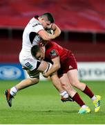 29 September 2018; Nick Timoney of Ulster is tackled by Rory Scannell of Munster during the Guinness PRO14 Round 5 match between Munster and Ulster at Thomond Park in Limerick. Photo by John Dickson/Sportsfile
