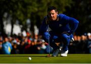 30 September 2018; Rory McIlroy of Europe lines up a putt on the 3rd green during his Singles Match against Justin Thomas of USA during the Ryder Cup 2018 Matches at Le Golf National in Paris, France. Photo by Ramsey Cardy/Sportsfile