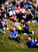 30 September 2018; Rory McIlroy of Europe plays a shot from the 9th hole bunker during his Singles Match against Justin Thomas of USA during the Ryder Cup 2018 Matches at Le Golf National in Paris, France. Photo by Ramsey Cardy/Sportsfile