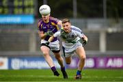 30 September 2018; Dan Brennan of St. Sylvesters in action against Ronan Ryan of Kilmacud Crokes during the Dublin County Senior Club Football Championship Quarter-Final match between St. Sylvester's and Kilmacud Crokes at Parnell Park in Dublin. Photo by Harry Murphy/Sportsfile