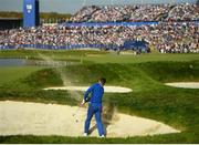30 September 2018; Rory McIlroy of Europe plays his 2nd shot out of the bunker on the 18th green during his Singles Match against Justin Thomas of USA during the Ryder Cup 2018 Matches at Le Golf National in Paris, France. Photo by Ramsey Cardy/Sportsfile