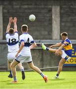 30 September 2018; Tommy McDaniel of Castleknock scores a point under pressure from Fiachra Breathnach, left, and Craig Wilson of St Vincent's during the Dublin County Senior Club Football Championship Quarter-Final match between St Vincent's and Castleknock at Parnell Park in Dublin. Photo by Harry Murphy/Sportsfile