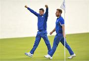 30 September 2018; Rory McIlroy, left, and Tyrrell Hatton of Europe celebrate winning following the Ryder Cup 2018 Matches at Le Golf National in Paris, France. Photo by Ramsey Cardy/Sportsfile