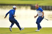 30 September 2018; Thorbjørn Olesen, left, and Alex Norén celebrate winning following the Ryder Cup 2018 Matches at Le Golf National in Paris, France. Photo by Ramsey Cardy/Sportsfile