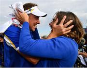 30 September 2018; Ian Poulter, left, and Tommy Fleetwood of Europe celebrate winning the Ryder Cup following the Ryder Cup 2018 Matches at Le Golf National in Paris, France. Photo by Ramsey Cardy/Sportsfile