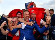 30 September 2018; Ian Poulter of Europe celebrates with supporters after winning the Ryder Cup following the Ryder Cup 2018 Matches at Le Golf National in Paris, France. Photo by Ramsey Cardy/Sportsfile