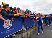 30 September 2018; Tommy Fleetwood of Europe celebrates with supporters after winning the Ryder Cup following the Ryder Cup 2018 Matches at Le Golf National in Paris, France. Photo by Ramsey Cardy/Sportsfile