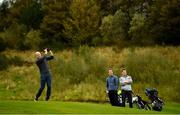 2 October 2018; Former Monaghan footballer Dick Clerkin, watched by current Monaghan footballers Jack McCarron and Conor McManus during the pro-am event at Concra Wood in Castleblayney, Co. Monaghan, ahead of the Monaghan Irish Challenge event which runs from the 4th to the 7th October. Tickets are available via Eventbrite. Photo by Ramsey Cardy/Sportsfile