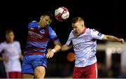 5 October 2018; Chris Lyons of Drogheda United in action against Lorcan Fitzgerald of Shelbourne during the SSE Airtricity League Promotion / Relegation Play-off Series 1st leg match between Drogheda United and Shelbourne at United Park, Drogheda, Co. Louth. Photo by Piaras Ó Mídheach/Sportsfile