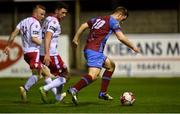 5 October 2018; Gareth McCaffrey of Drogheda United in action against Lorcan Fitzgerald, left, and Mark Hughes of Shelbourne during the SSE Airtricity League Promotion / Relegation Play-off Series 1st leg match between Drogheda United and Shelbourne at United Park, Drogheda, Co. Louth. Photo by Piaras Ó Mídheach/Sportsfile