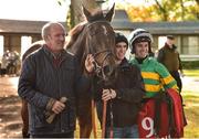 6 October 2018; Trainer Niall Madden Senior with his sons, Tom the groom of Pass The Ball, and jockey Niall Madden, after winning the Kilkenny Racing Festival Handicap Hurdle during Champion Chase Day at Gowran Park Races in Gowran, Kilkenny. Photo by Matt Browne/Sportsfile