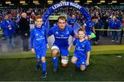6 October 2018; Matchday mascots 9 year old Dylan Evans, from Delgany, Co. Wicklow, and 7 year old Killian Dardis, from Derrymore, Killucan, Co. Westmeath, with Leinster captain Rhys Ruddock ahead of the Guinness PRO14 Round 6 match between Leinster and Munster at the Aviva Stadium in Dublin. Photo by Ramsey Cardy/Sportsfile