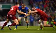 6 October 2018; Dan Leavy of Leinster is tackled by Niall Scannell, left, and Sammy Arnold of Munster during the Guinness PRO14 Round 6 match between Leinster and Munster at the Aviva Stadium in Dublin. Photo by Ramsey Cardy/Sportsfile