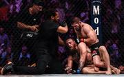 6 October 2018; Referee Herb Dean stops the fight between Conor McGregor and Khabib Nurmagomedov in the fourth round of their UFC lightweight championship fight during UFC 229 at T-Mobile Arena in Las Vegas, Nevada, USA. Photo by Stephen McCarthy/Sportsfile