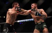 6 October 2018; Conor McGregor, right, in action against Khabib Nurmagomedov in their UFC lightweight championship fight during UFC 229 at T-Mobile Arena in Las Vegas, Nevada, USA. Photo by Stephen McCarthy/Sportsfile