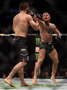 6 October 2018; Conor McGregor, right, in action against Khabib Nurmagomedov in their UFC lightweight championship fight during UFC 229 at T-Mobile Arena in Las Vegas, Nevada, USA. Photo by Stephen McCarthy/Sportsfile