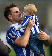 7 October 2018; Shane Durkin of Ballyboden St Enda's celebrates with his son Ollie Durkin, aged 1, after the Dublin County Senior Club Hurling Championship semi-final match between St Vincent's and Ballyboden St Enda's at Parnell Park in Dublin. Photo by Daire Brennan/Sportsfile