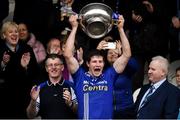 7 October 2018; Scotstown captain Darren Hughes lifts the Mick Duffy Cup following the Monaghan County Senior Club Football Championship Final match between Scotstown and Ballybay Pearse Brothers at St Tiernach's Park in Clones, Co Monaghan. Photo by Philip Fitzpatrick/Sportsfile
