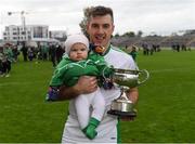 7 October 2018; Coolderry hurler Brian Carroll with his daughter Ellie, age 8 months, and the Seán Robbins Cup after the Offaly County Senior Club Hurling Championship Final match between Coolderry and Kilcormac/Killoughey at Bord Na Móna O'Connor Park in Tullamore, Co Offaly. Photo by Piaras Ó Mídheach/Sportsfile