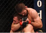 6 October 2018; Khabib Nurmagomedov locks in a rear naked choke on Conor McGregor, resulting in a tap out, in their UFC lightweight championship fight during UFC 229 at T-Mobile Arena in Las Vegas, Nevada, USA. Photo by Stephen McCarthy/Sportsfile